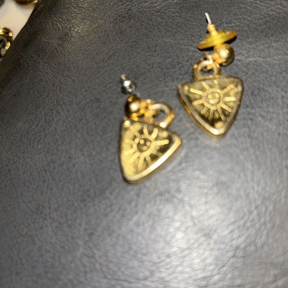 Scorpio gold colored women’s earrings